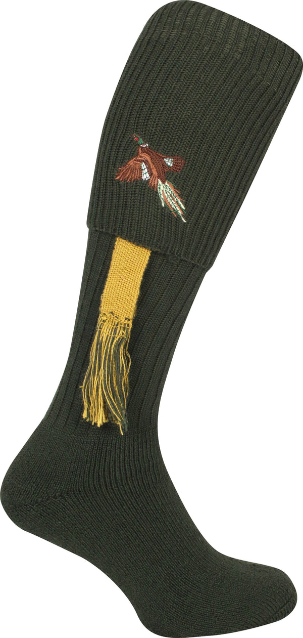 Shooting socks in green with a pheasant embroided at the top. Their is a yello garter hanging down from the sock.